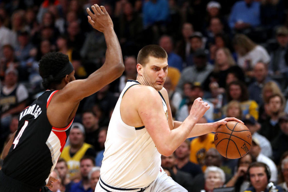  约基奇20+15掘金轻取森林狼  